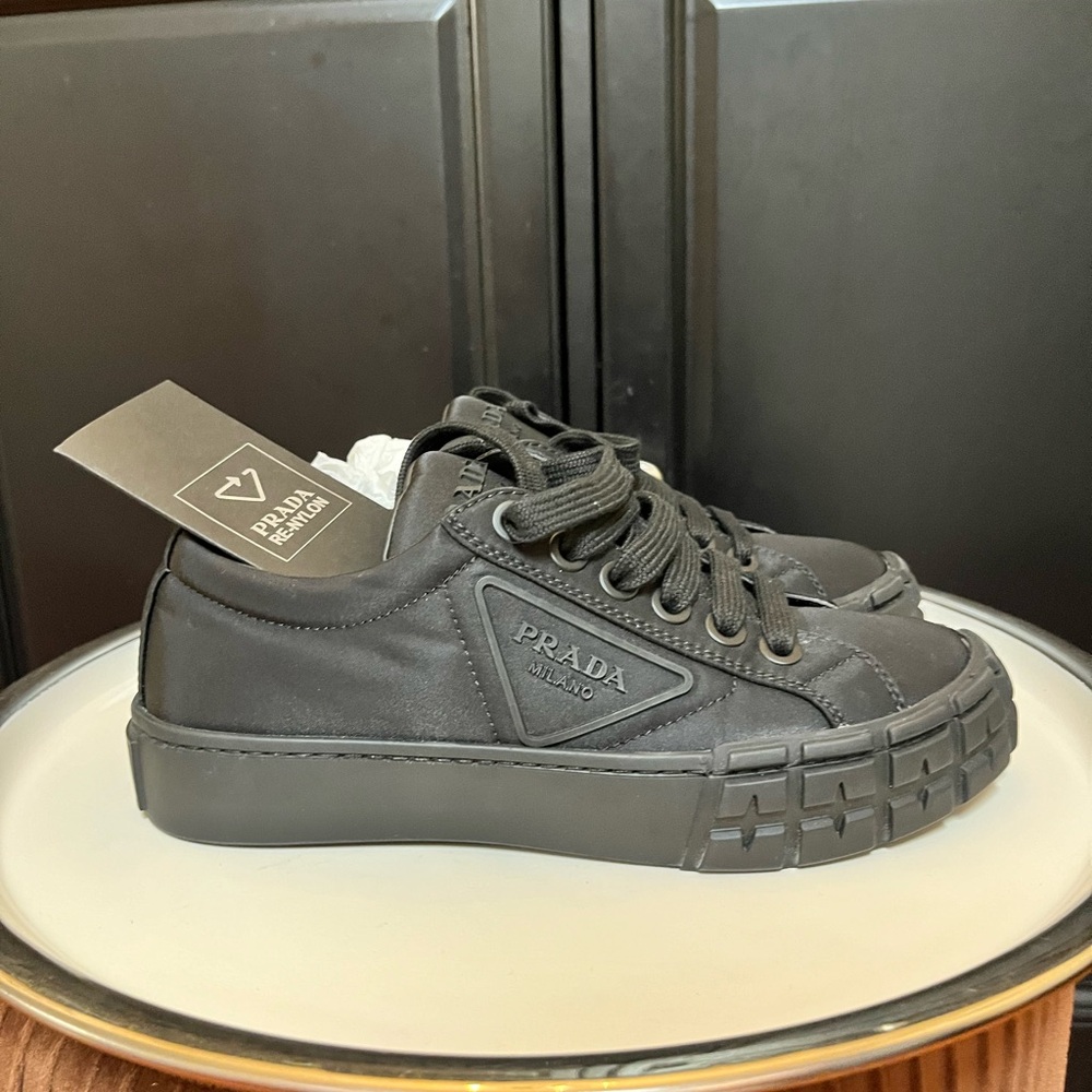 Prada Re-Nylon black on black lug sole sneakers